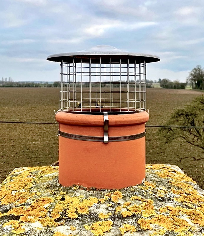 Bird guard and cowl fitting, Sudbury, Suffolk